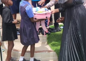 Sixty-one learners benfit from Prophetess Matimbire’s back to school donations