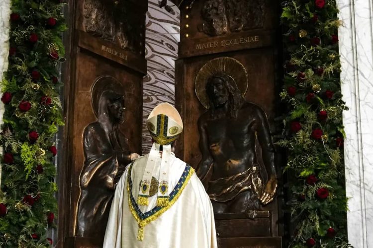 Cardinal Rolandas Makrickas, archpriest of Rome's Basilica of St. Mary Major, solemnly closes the basilica's Holy Door Dec. 25 as the Jubilee Year was ending.
