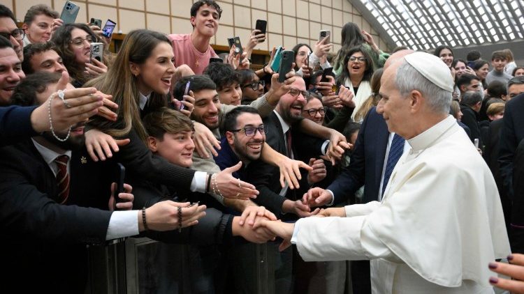 Pope Leo greets some of the young people in St Paul VI Hall   (@VATICAN MEDIA)