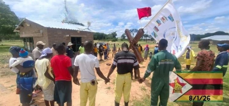 Enthusiastic crowds slow down cross walk through Zimbabwe